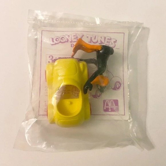 Vintage 1989 Daffy Duck Looney Tunes McDonalds Toy with Car Sealed - Picture 1 of 6